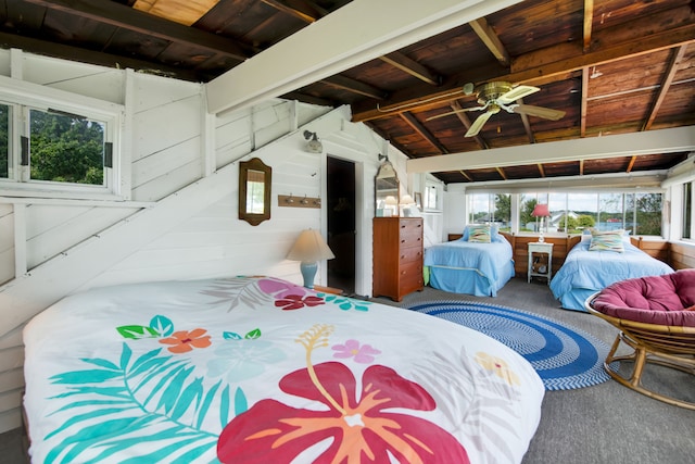 bedroom with carpet flooring and wooden ceiling