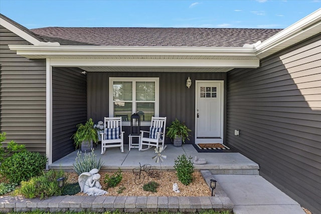 3582 Pratt Dr, Lapeer, MI 48446 - doorway to property featuring covered porch and roof with shingles
