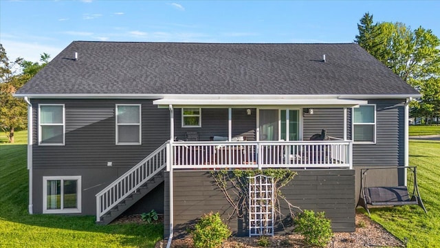 3582 Pratt Dr, Lapeer, MI 48446 - rear view of house featuring stairs, a lawn, and roof with shingles