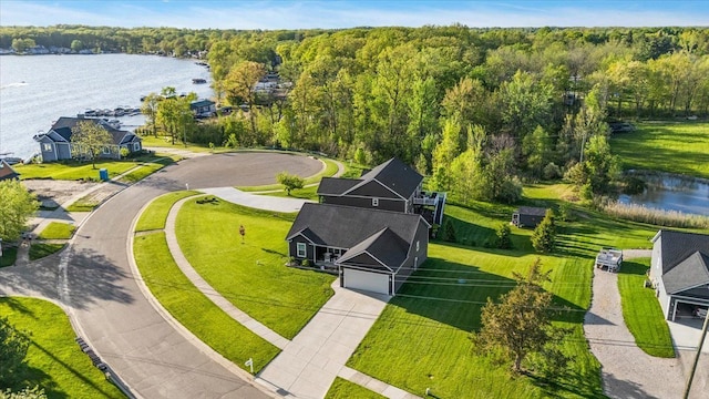 3582 Pratt Dr, Lapeer, MI 48446 - drone / aerial view of a large body of water and a heavily wooded area