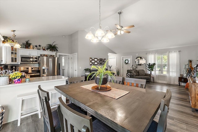 3582 Pratt Dr, Lapeer, MI 48446 - dining space with a chandelier, high vaulted ceiling, a ceiling fan, and dark wood-style flooring
