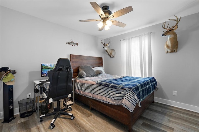 3582 Pratt Dr, Lapeer, MI 48446 - bedroom featuring wood finished floors, baseboards, and a ceiling fan