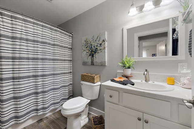 3582 Pratt Dr, Lapeer, MI 48446 - bathroom featuring toilet, vanity, wood finished floors, and curtained shower