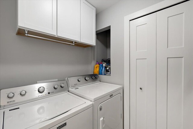 3582 Pratt Dr, Lapeer, MI 48446 - washroom featuring separate washer and dryer and cabinet space