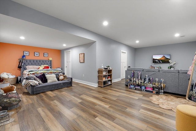 3582 Pratt Dr, Lapeer, MI 48446 - bedroom with wood finished floors, recessed lighting, and baseboards