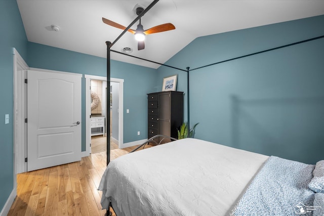 2307 Tecumseh Dr, Brooklyn, MI 49230 - bedroom with light wood finished floors, vaulted ceiling, baseboards, and a ceiling fan