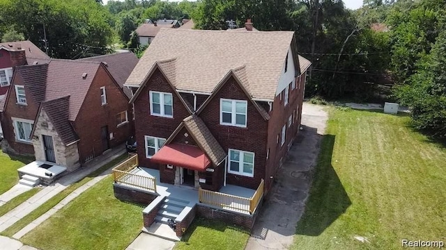 16917 Monica St, Detroit, MI 48221 - view of front facade with a porch and a front yard