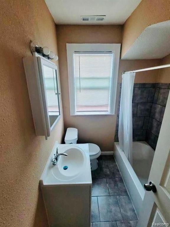 16917 Monica St, Detroit, MI 48221 - full bath with toilet, vanity, shower / tub combo with curtain, and tile patterned flooring