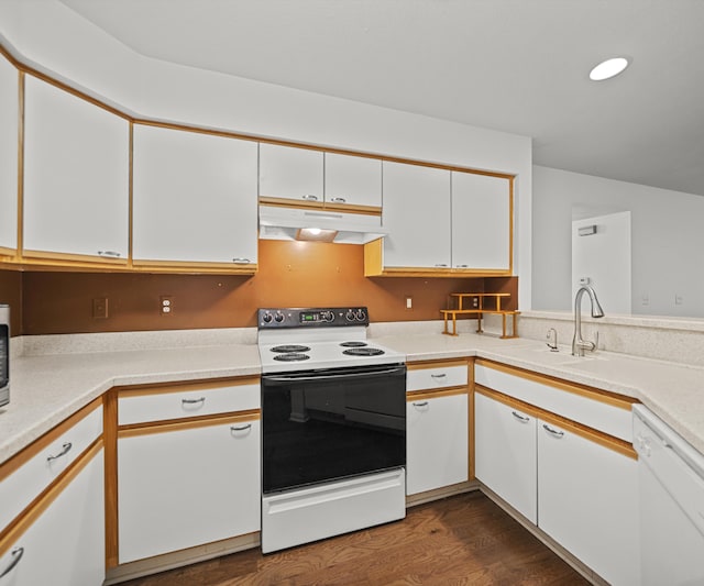 1379 Millbrook Trl, Ann Arbor, MI 48108 - kitchen with under cabinet range hood, range with electric stovetop, white dishwasher, white cabinetry, and light countertops