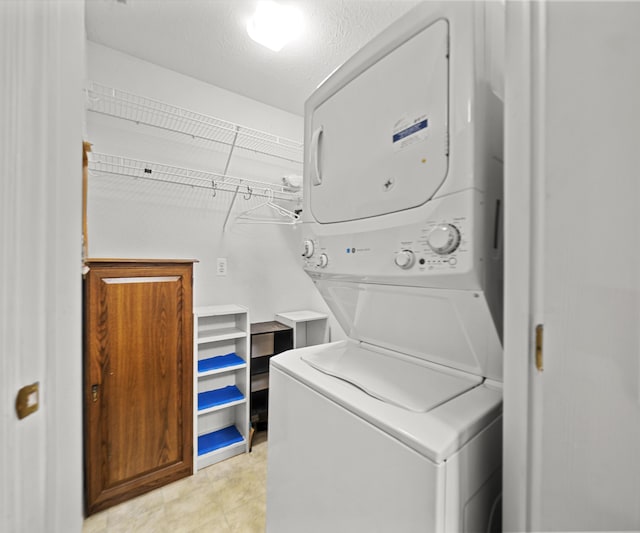 1379 Millbrook Trl, Ann Arbor, MI 48108 - washroom with stacked washer / drying machine