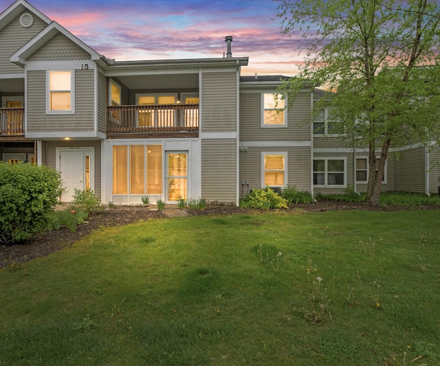 1379 Millbrook Trl, Ann Arbor, MI 48108 - back of house featuring a yard and a balcony