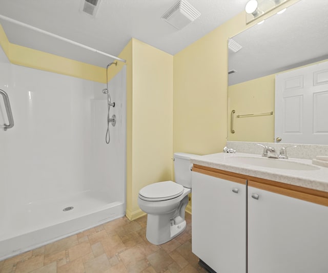 1379 Millbrook Trl, Ann Arbor, MI 48108 - full bath with stone finish flooring, toilet, a shower, and vanity