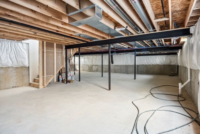 45070 Twin River Dr, Macomb, MI 48044 - unfinished basement with stairs