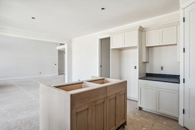 45070 Twin River Dr, Macomb, MI 48044 - kitchen featuring a center island and dark countertops