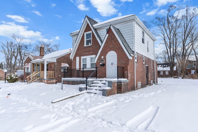 15748 Freeland St, Detroit, MI 48227 - tudor house with brick siding and a chimney