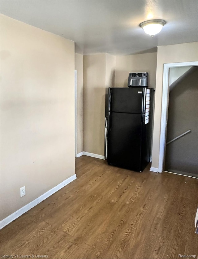 1216 E George Ave, Hazel Park, MI 48030 - kitchen with freestanding refrigerator, wood finished floors, and baseboards