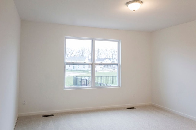 58216 Kincaid St, New Haven, MI 48048 - carpeted empty room with baseboards