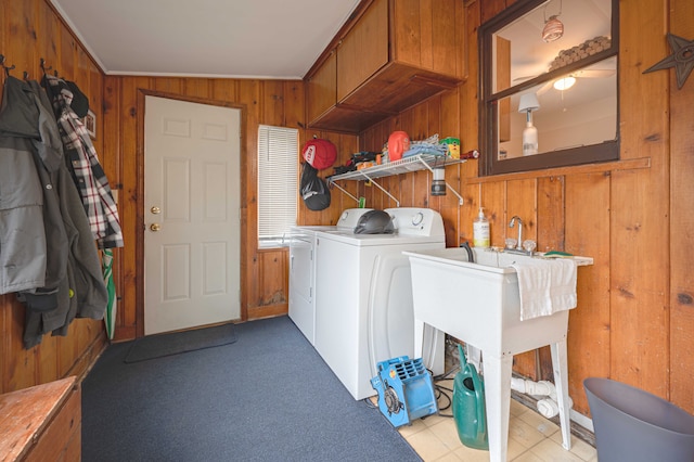 406 Common St, Walled Lake, MI 48390 - laundry room featuring wooden walls and separate washer and dryer