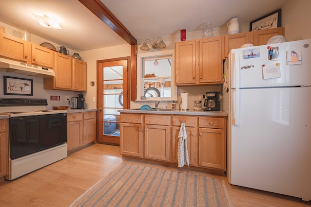 406 Common St, Walled Lake, MI 48390 - kitchen featuring white appliances, under cabinet range hood, light countertops, beamed ceiling, and light wood-style flooring