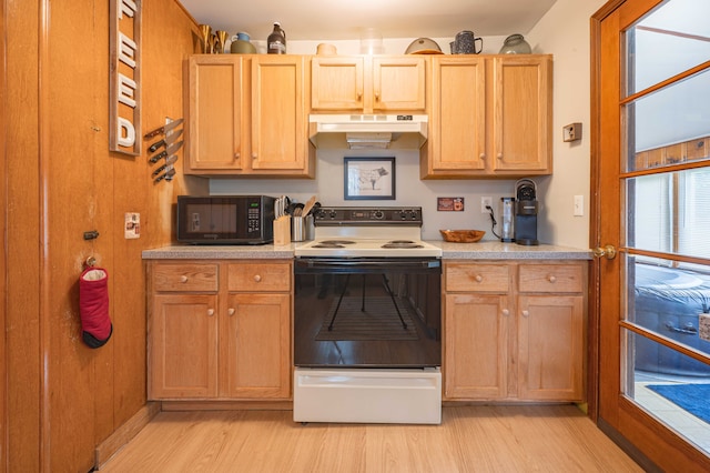 406 Common St, Walled Lake, MI 48390 - kitchen featuring electric stove, under cabinet range hood, black microwave, light wood-style floors, and light countertops