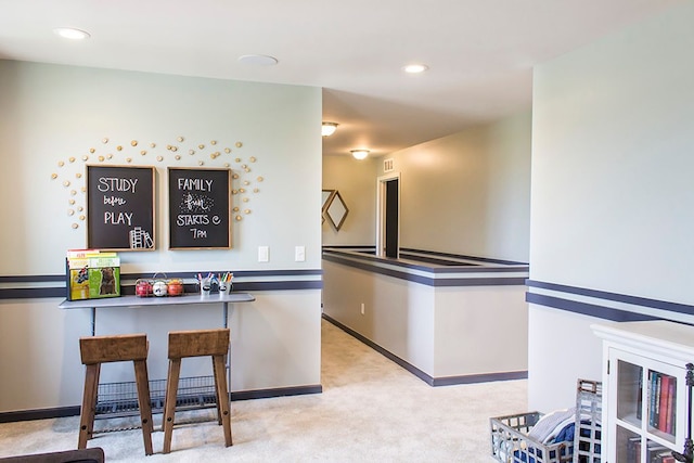 58204 Kincaid St, New Haven, MI 48048 - kitchen featuring carpet flooring, baseboards, and recessed lighting