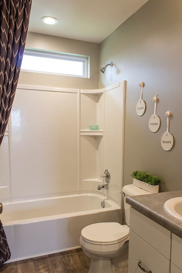 58204 Kincaid St, New Haven, MI 48048 - full bath with toilet, bathtub / shower combination, vanity, wood finished floors, and recessed lighting