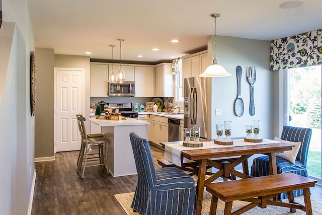 58204 Kincaid St, New Haven, MI 48048 - dining room featuring dark wood finished floors, recessed lighting, baseboards, and a chandelier