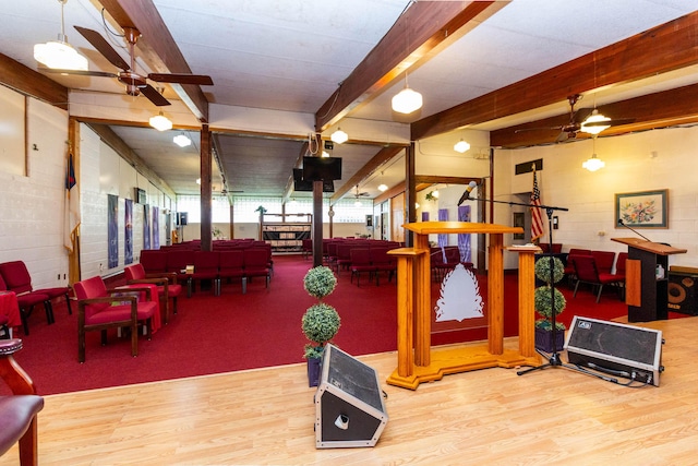 20800 Lefever Ave, Warren, MI 48091 - gym featuring wood finished floors, a ceiling fan, beamed ceiling, and concrete block wall