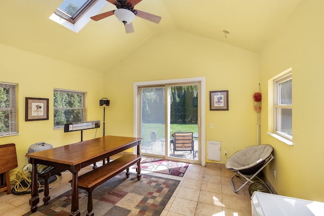 935 S Brys Dr, Grosse Pointe Woods, MI 48236 - dining room featuring ceiling fan, tile patterned floors, high vaulted ceiling, and a skylight