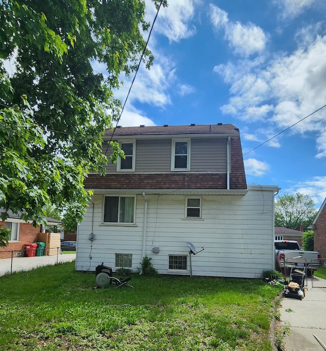 22045 Elmwood Ave, Eastpointe, MI 48021 - back of property featuring roof with shingles