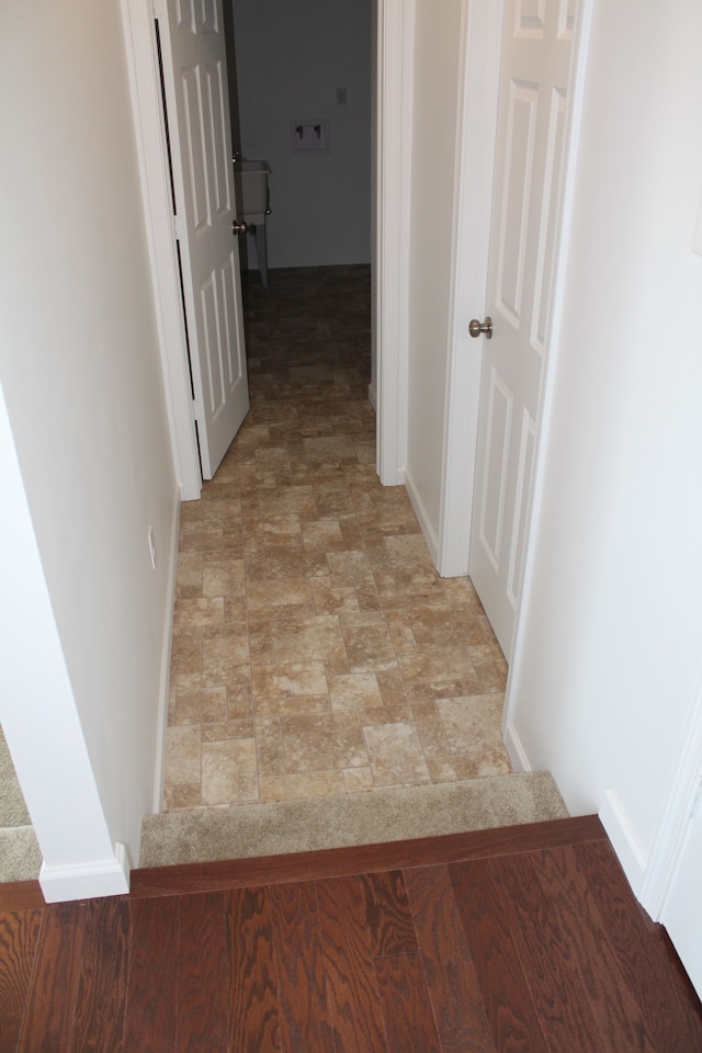 58192 Kincaid St, New Haven, MI 48048 - hall with baseboards and stone finish flooring