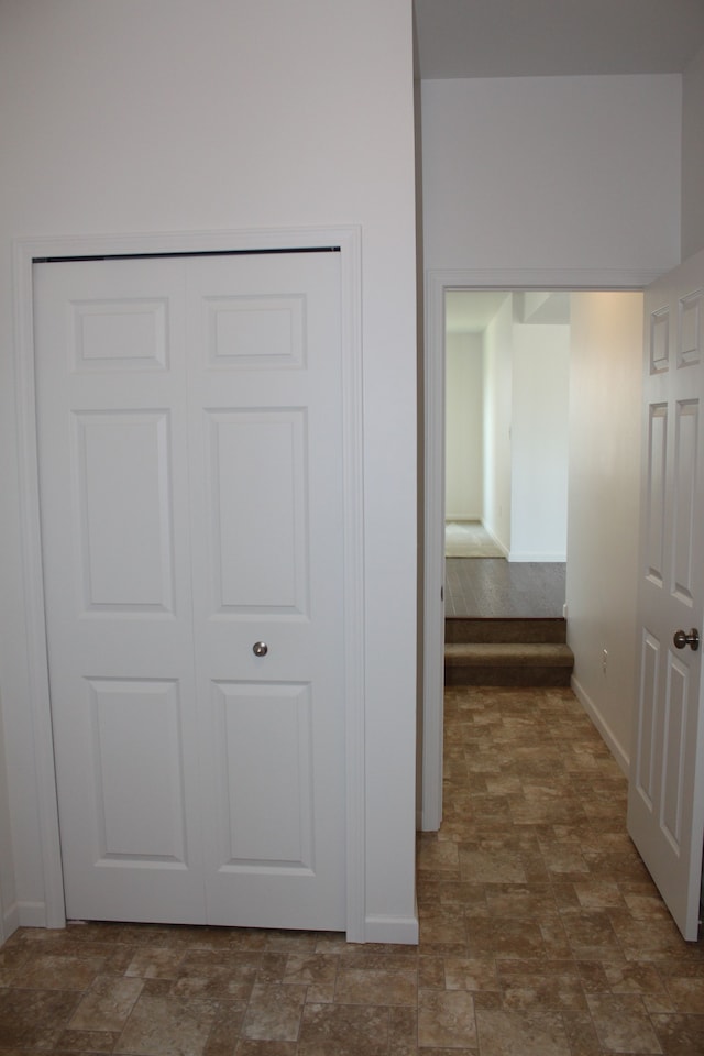 58192 Kincaid St, New Haven, MI 48048 - hallway with stone finish floors and baseboards