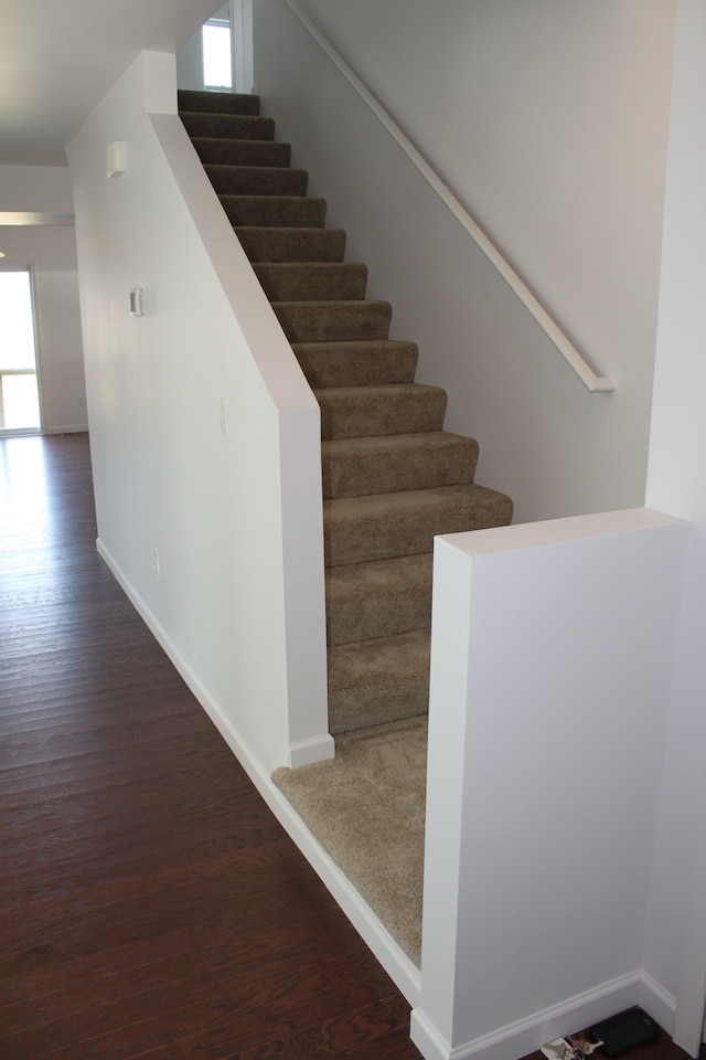 58192 Kincaid St, New Haven, MI 48048 - stairway featuring wood finished floors and baseboards