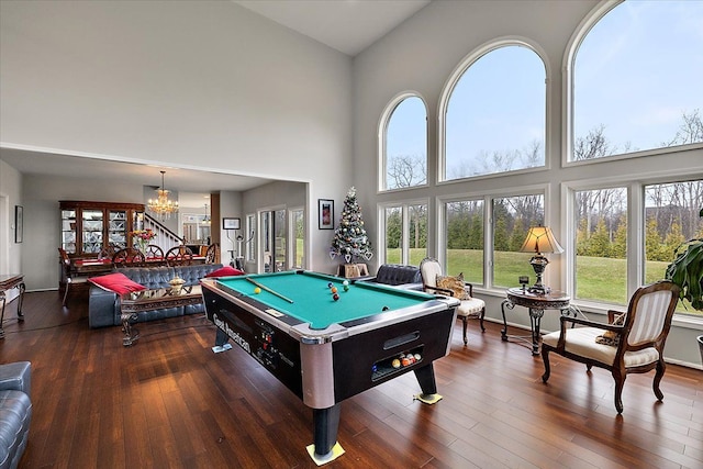 58 Ingram Dr, Troy, MI 48098 - rec room featuring billiards, high vaulted ceiling, wood finished floors, and a chandelier