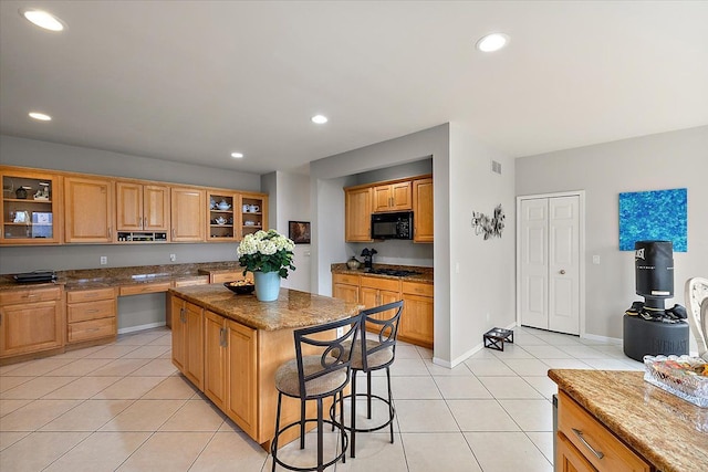 58 Ingram Dr, Troy, MI 48098 - kitchen with black appliances, light tile patterned flooring, a center island, glass insert cabinets, and recessed lighting