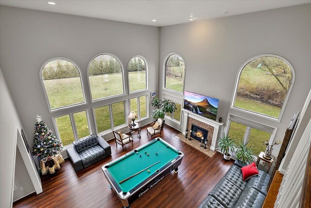 58 Ingram Dr, Troy, MI 48098 - playroom with a high ceiling, healthy amount of natural light, billiards table, a fireplace, and recessed lighting