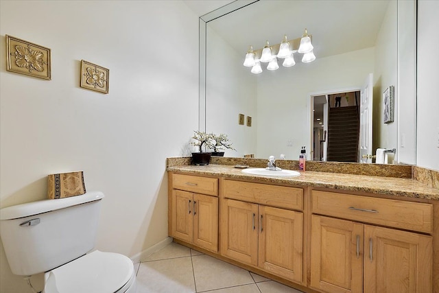 58 Ingram Dr, Troy, MI 48098 - bathroom with tile patterned floors, toilet, and vanity