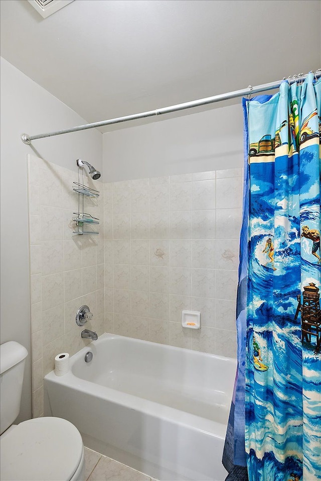 58 Ingram Dr, Troy, MI 48098 - bathroom featuring toilet, shower / bath combo with shower curtain, and tile patterned floors