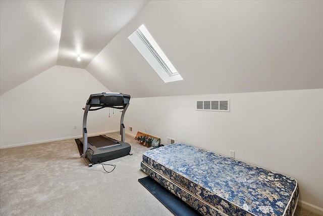 58 Ingram Dr, Troy, MI 48098 - exercise area with a skylight, vaulted ceiling, carpet floors, and baseboards