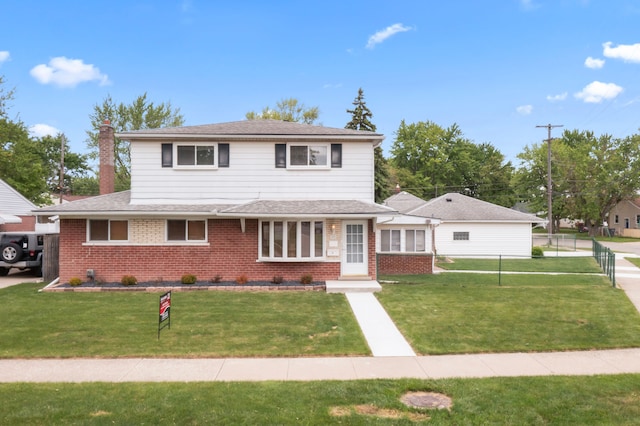2070 Meyer Ct, Lincoln Park, MI 48146 - traditional-style house with brick siding and a chimney