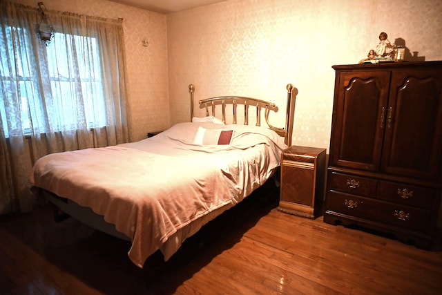 17620 Rudgate St, Southgate, MI 48195 - bedroom featuring wood finished floors and wallpapered walls