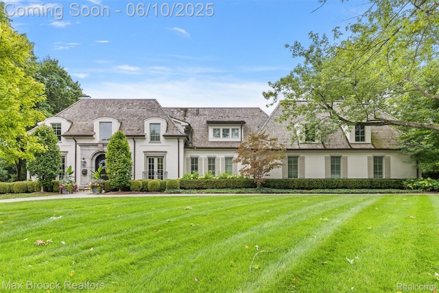 1475 Tottenham Rd, Bloomfield Hills, MI 48301 - french country home featuring a front yard and stucco siding