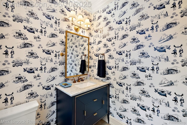 1475 Tottenham Rd, Bloomfield Hills, MI 48301 - half bath featuring wallpapered walls, toilet, vanity, a chandelier, and baseboards