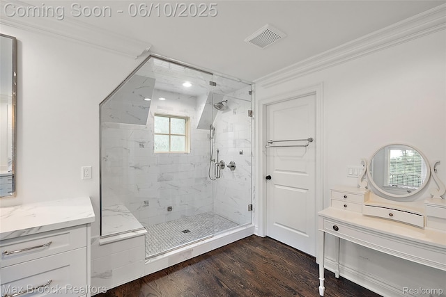 1475 Tottenham Rd, Bloomfield Hills, MI 48301 - bathroom with a marble finish shower, crown molding, vanity, plenty of natural light, and wood finished floors