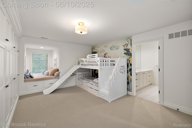 1475 Tottenham Rd, Bloomfield Hills, MI 48301 - bedroom with light colored carpet, baseboards, and connected bathroom