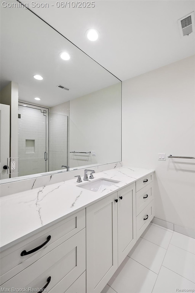 1475 Tottenham Rd, Bloomfield Hills, MI 48301 - bathroom featuring vanity, recessed lighting, a stall shower, baseboards, and tile patterned floors