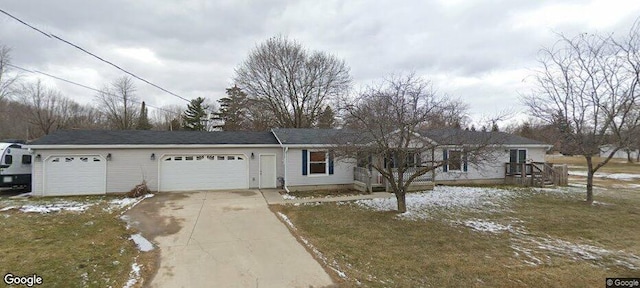 3048 Vineland Ave, Burton, MI 48519 - ranch-style home with a garage and concrete driveway