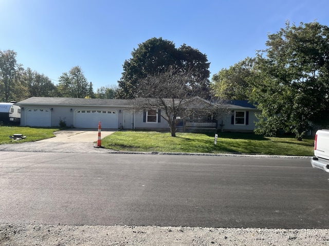 3048 Vineland Ave, Burton, MI 48519 - single story home featuring a garage, driveway, and a front lawn