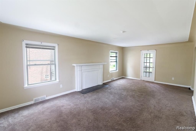 15470 Mapleridge St, Detroit, MI 48205 - unfurnished living room featuring carpet flooring and baseboards