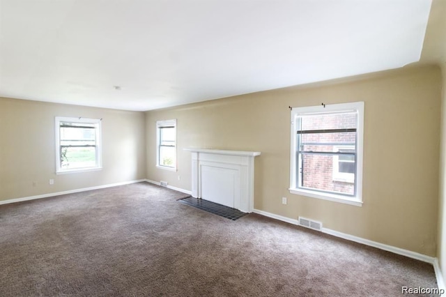 15470 Mapleridge St, Detroit, MI 48205 - unfurnished living room featuring carpet and baseboards